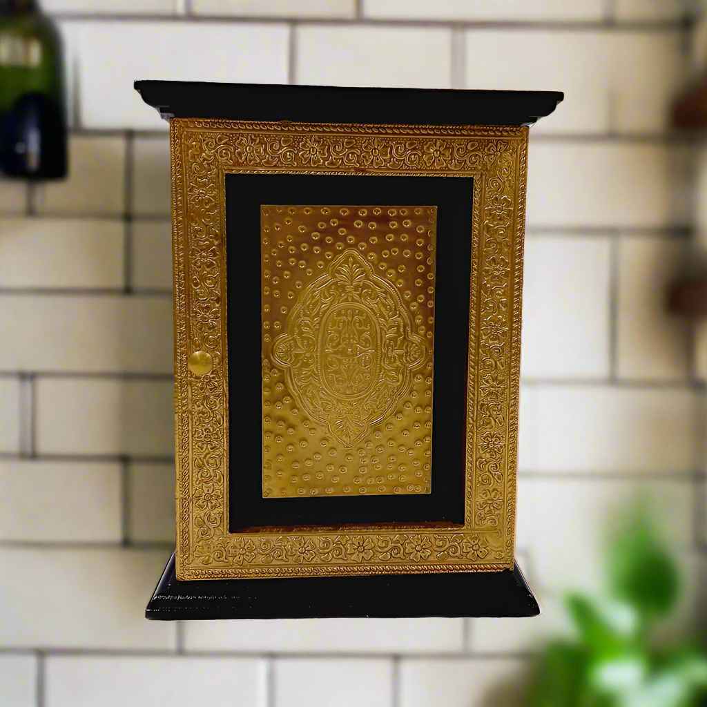 Decorative wooden key holder with a closed-box design and intricate metallic accents for a timeless look.