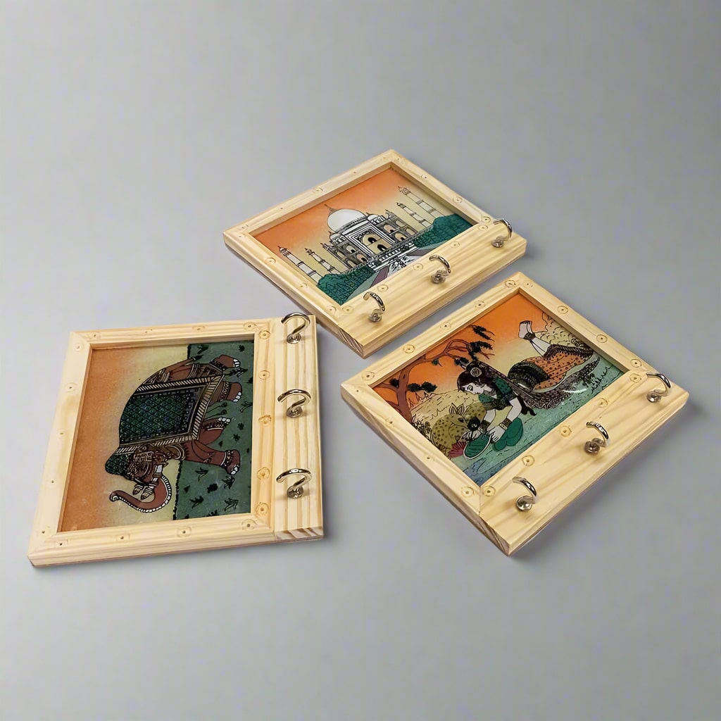 Handcrafted wooden key holder with gemstone painting of elephant, Taj Mahal, and lady.