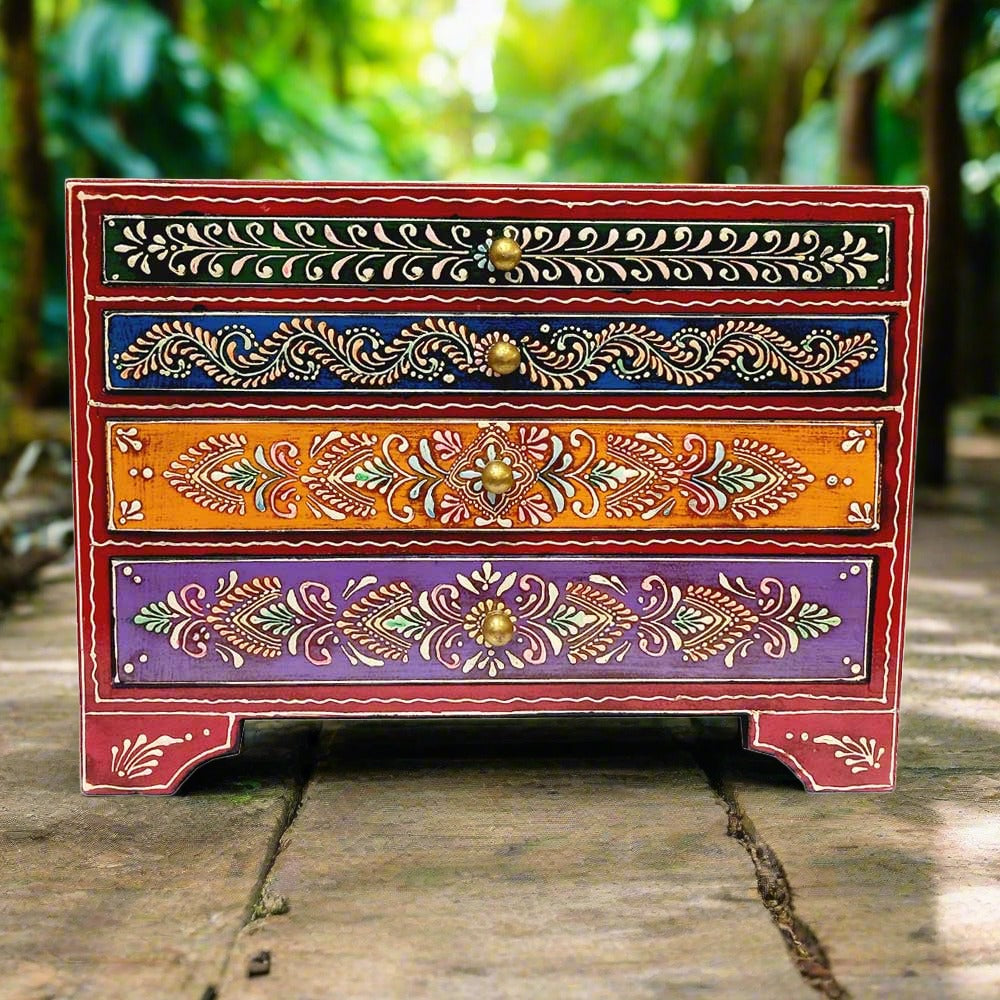 A wooden organizer with 4 drawers for storing earrings, jhumkas, pins, and other jewelry.