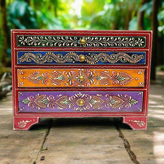 A wooden organizer with 4 drawers for storing earrings, jhumkas, pins, and other jewelry.
