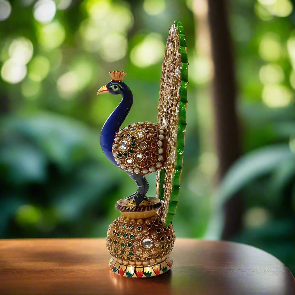 Decorative peacock sculpture adorned with stones and beads