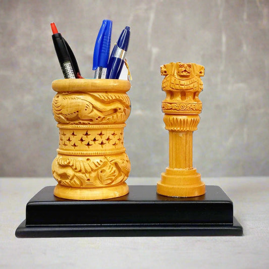 Wooden pen holder featuring Ashok Pillar design with fine carving.