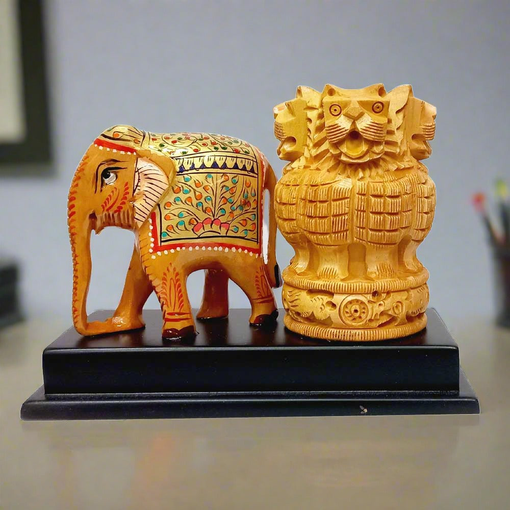 Wooden pen stand featuring Ashoka Pillar design and carved elephant.