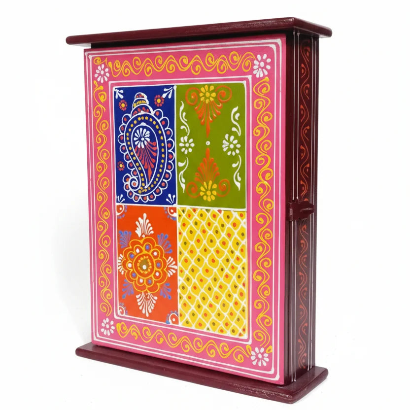 Side view of Rajasthani wooden key organizer box showing embossed painting and sturdy hanging design.