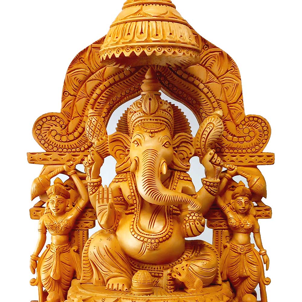 Handmade riddhi siddhi ganesha in wood carving.