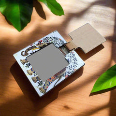 A wooden vanity mirror with a lady design, a great accessory for parties and weddings.