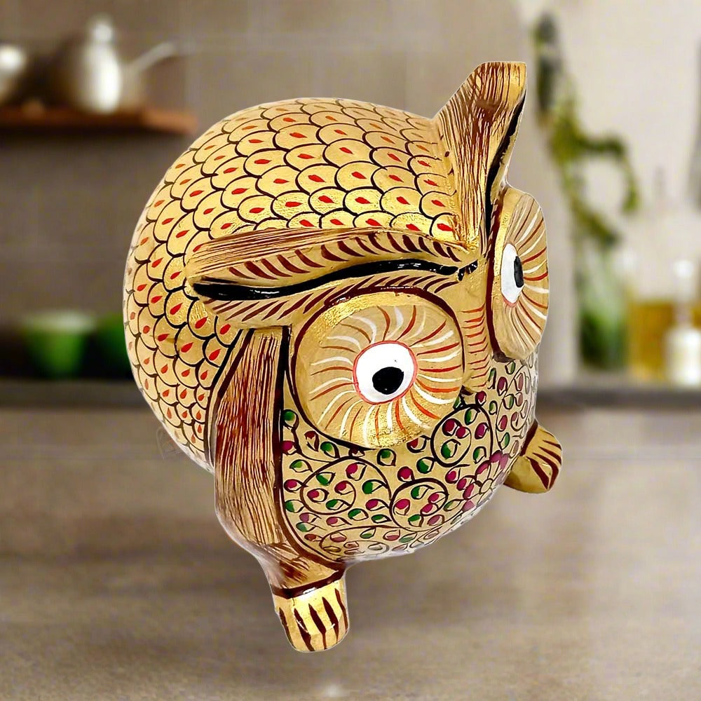A 10cm Kadamba wood owl showpiece, a beautiful and attractive gift item.
