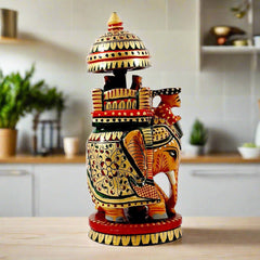 A 16cm handmade wooden elephant showpiece, an ideal item for gifting.