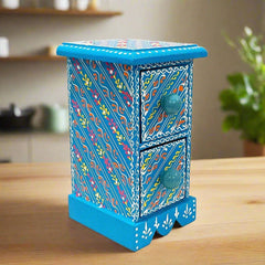 An 18cm beautiful wooden trinket box with two drawers and decorative knobs.