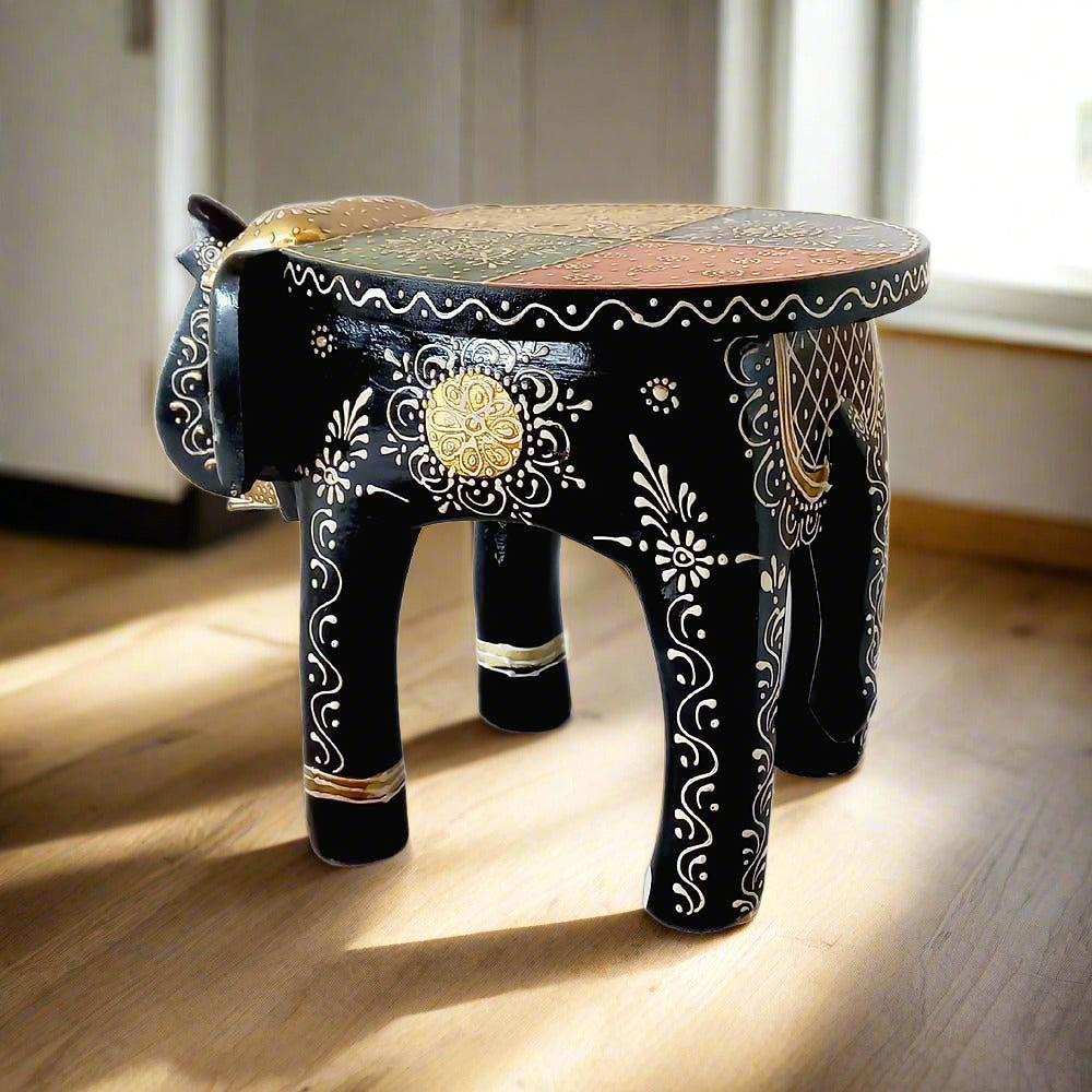 A 25cm wooden elephant showpiece that doubles as a stool, with beautiful emboss painting.
