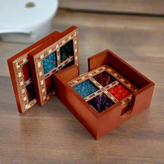Artisanal wooden coasters inlaid with colorful gemstone design