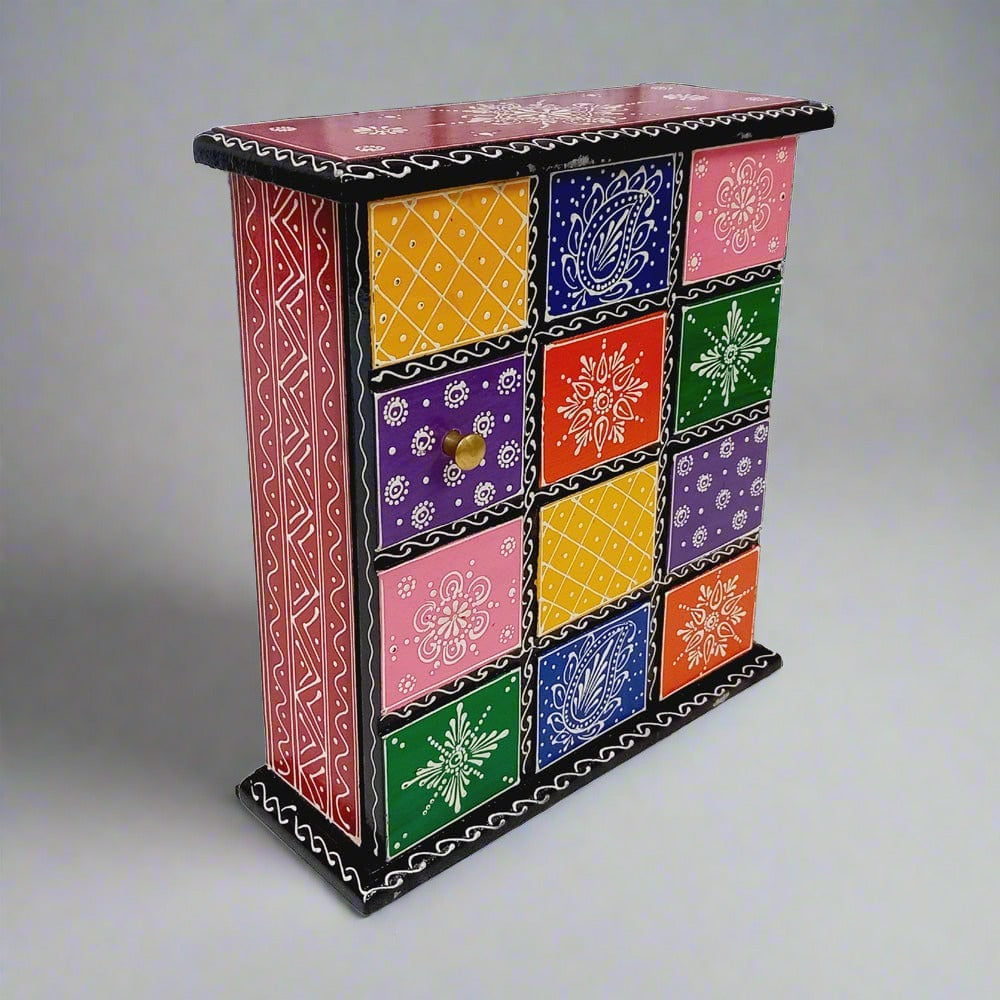 Artistic hand-painted wooden key box for organized key storage, suitable for home and office use.