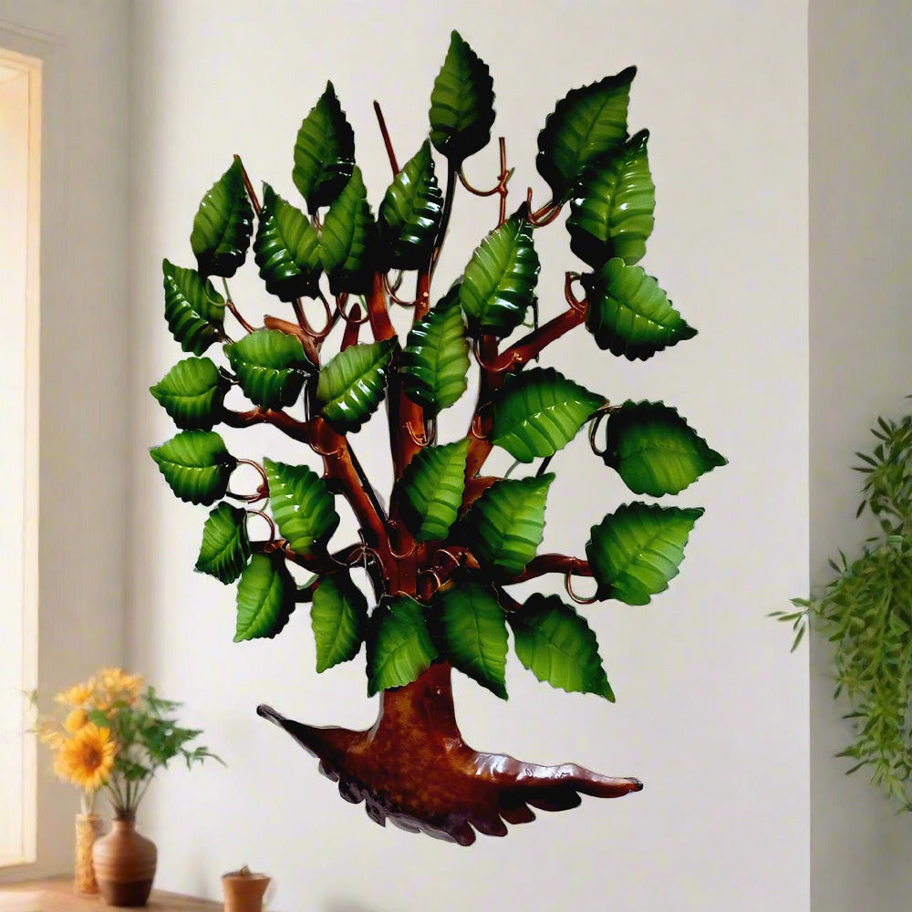 Artistic metal tree wall hanging featuring beautiful painted details, enhancing home decor with charm.