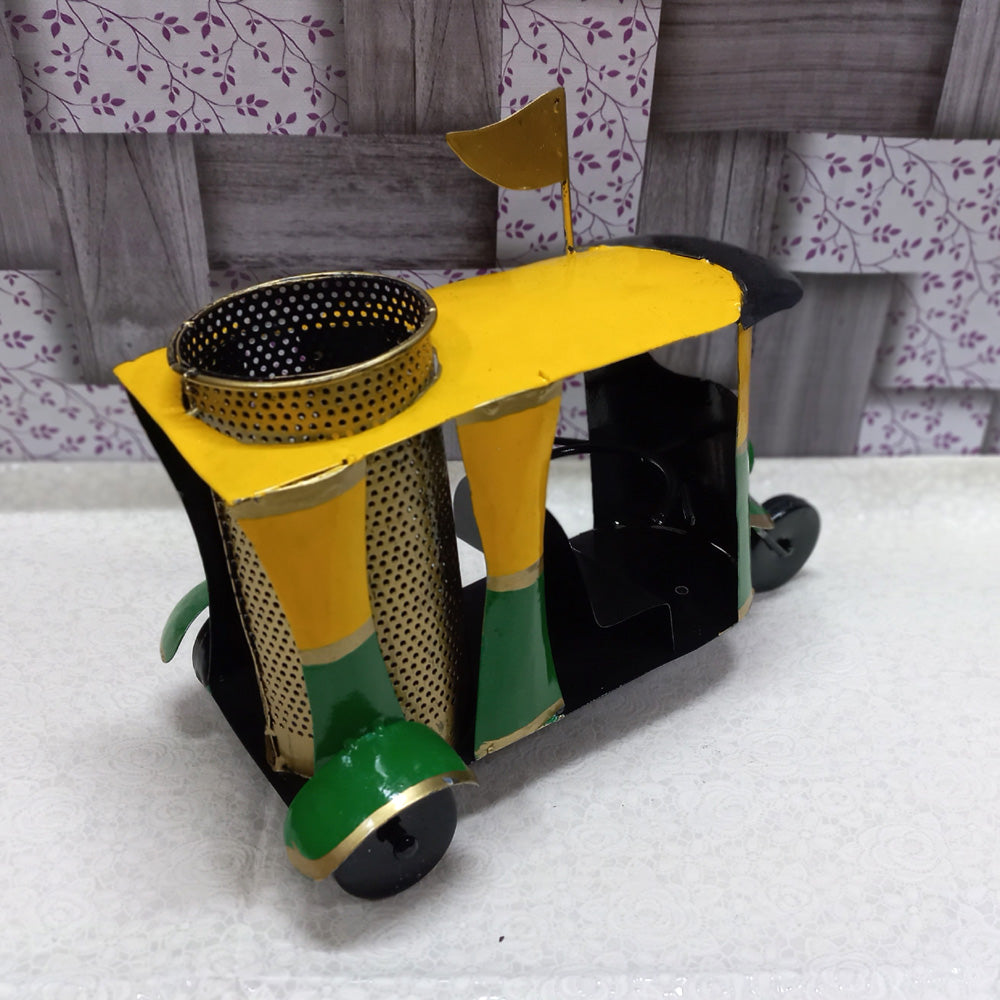 Artistic hand-painted auto rickshaw metal pen stand, combining traditional art with practical office utility.