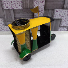 Artistic hand-painted auto rickshaw metal pen stand, combining traditional art with practical office utility.