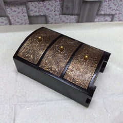 Artistic wooden and metal drawer box with vintage floral metal sheets and three storage compartments.