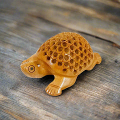 Auspicious wooden tortoise statue with fine lattice carvings, perfect for spiritual and decorative use.
