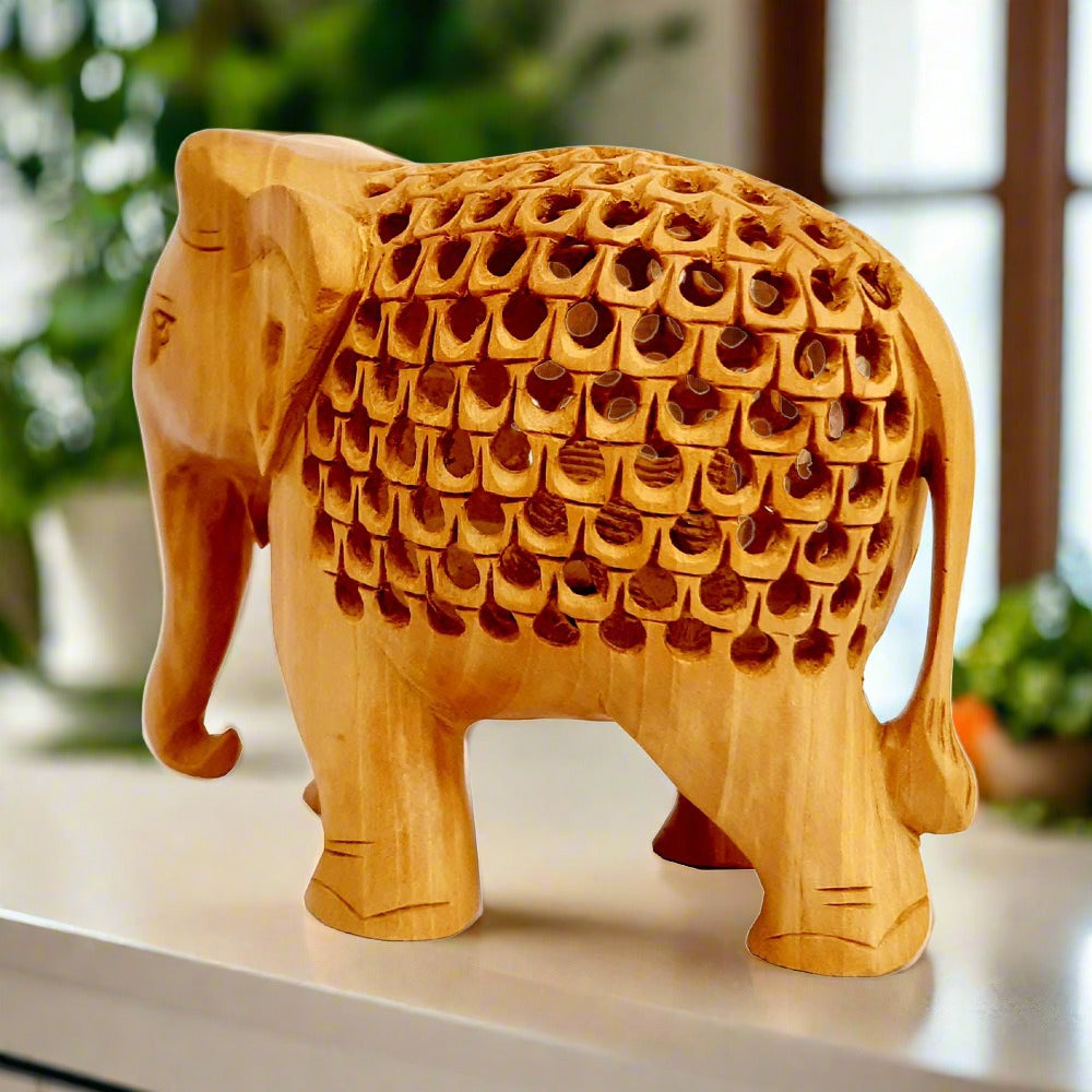 Wooden elephant statue with mesh stomach design carrying baby elephant, crafted for decor and gifting