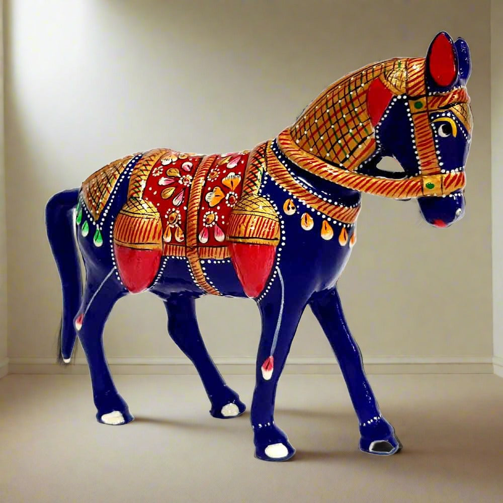 A beautiful horse figurine with enamel meenakari painting that stays vibrant for a long time.