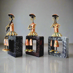 A beautiful hand-painted musical figurine set, a perfect addition to home decor.