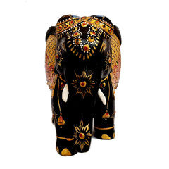 Black and gold floral painted wooden elephant with low trunk, crafted for gifting and decorative use