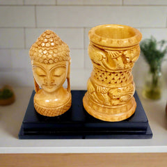 Handmade wooden Buddha pen stand for office table and study desk decor.