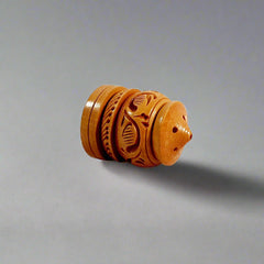 A carved wood agarbatti stand for a prayer room, with beautiful carving.