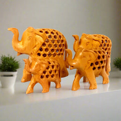 Carved wooden elephant figurines in small to big sizes
