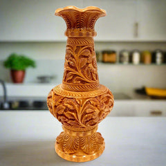 Carved wooden flower pot for home and office decoration.