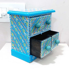 A colorful wooden jewelry gift box with 4 drawers, a perfect way to store or present jewelry.