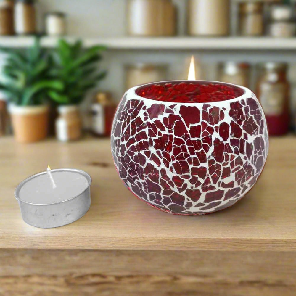 Elegant crackle design glass candle holder set with candle, creating a warm atmosphere for special occasions.