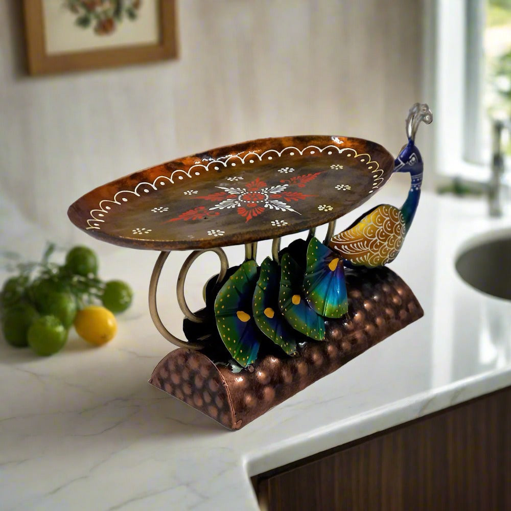 Decorative hand-painted metal peacock tray with vibrant colors and intricate design, enhancing kitchen and dining spaces.