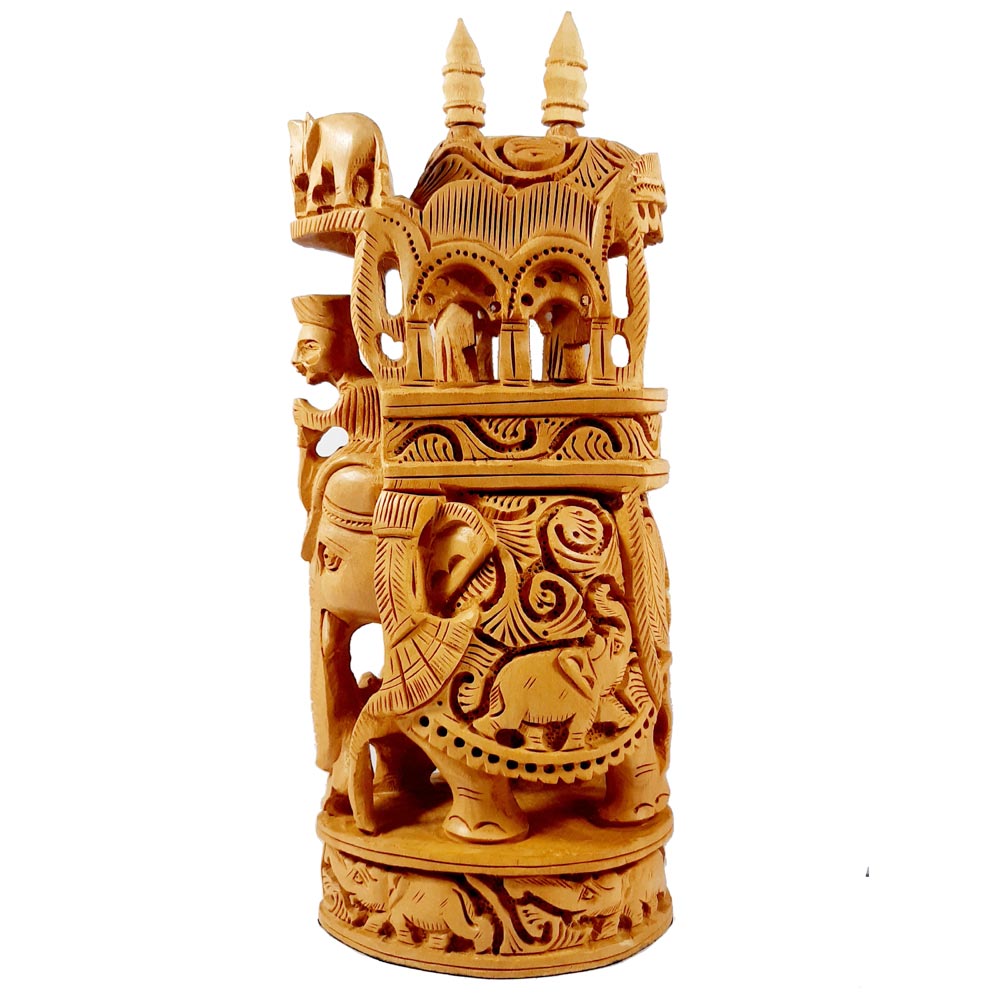 Decoratively carved Amabari elephant made of kadamb wood, showcasing fine craftsmanship and royal symbolism.