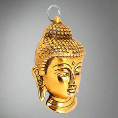 Decorative metal Buddha head for wall hanging, compact size with golden polish, suitable for gifting.