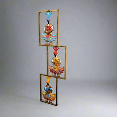 Decorative metal wall hanging frame with different musician figures in colorful traditional style, pleasing and artistic.