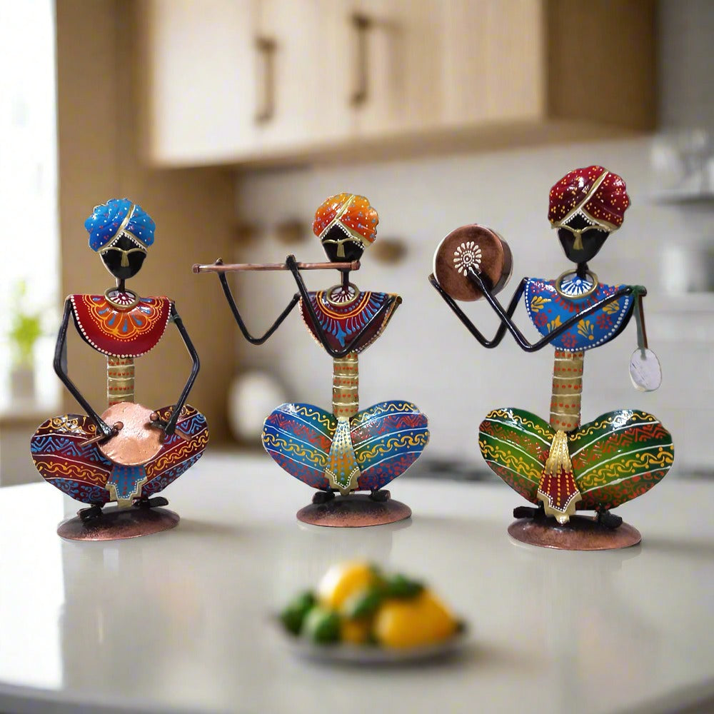 Decorative Rajasthani musician metal set with three pieces, featuring vibrant hand painting and detailed craftsmanship.