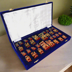 Decorative wooden chess set in red and green tones, finely hand painted and crafted with finest quality wood.