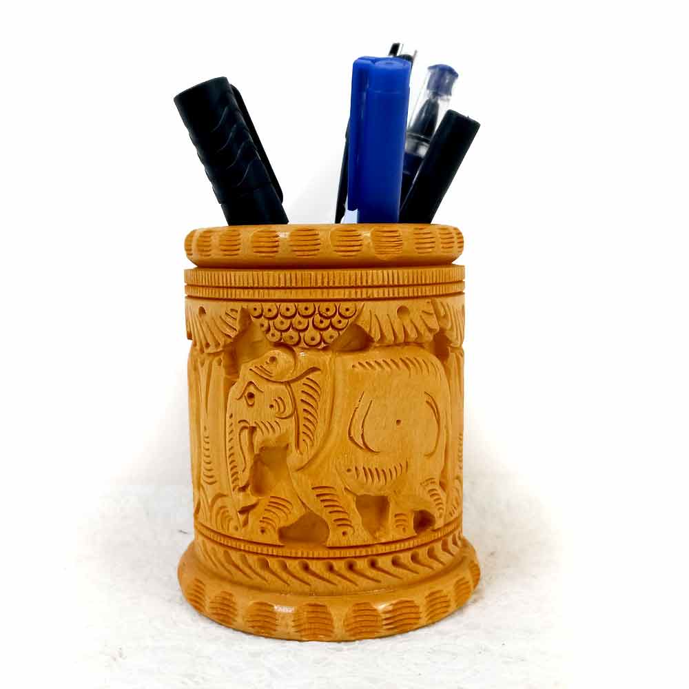 A thick-sized pen holder made of dry, good quality wood, with ample space for all your stationery.