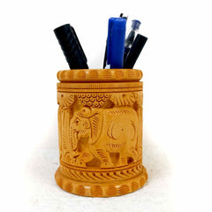 A thick-sized pen holder made of dry, good quality wood, with ample space for all your stationery.
