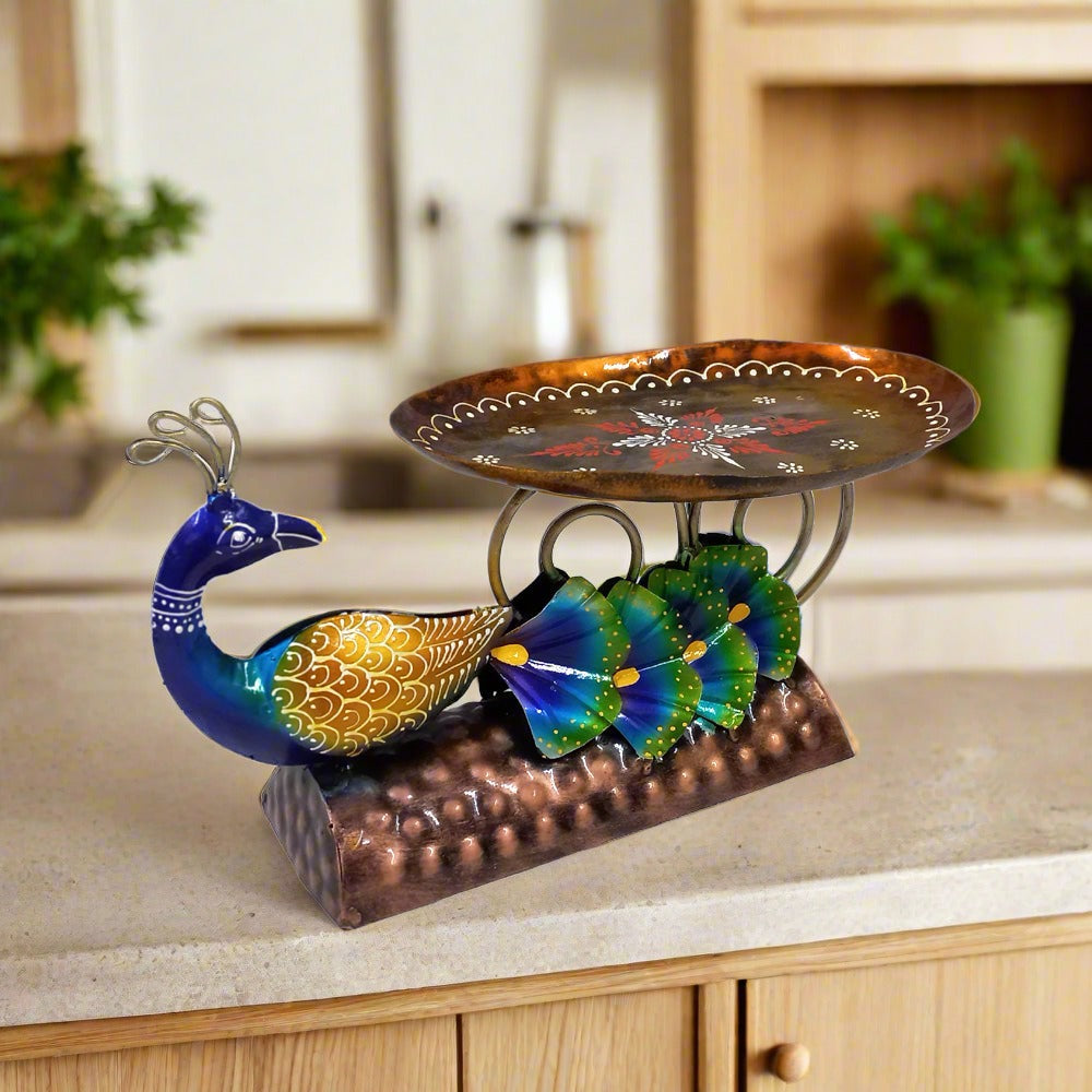 Elegant hand-painted metal peacock platter showing vibrant colors and detailed craftsmanship, suitable for gifting.