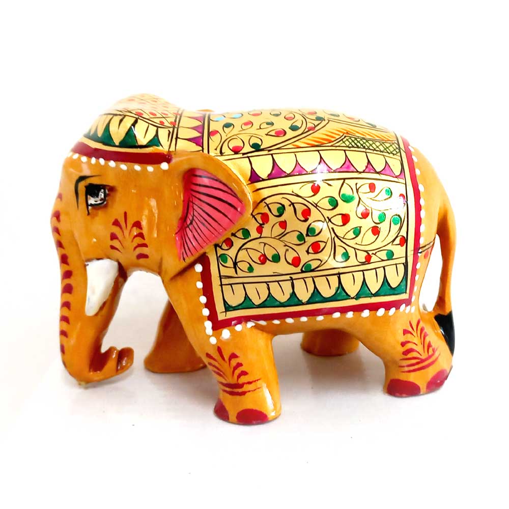 Elegant wooden elephant hand-painted with bright floral motifs in red and green on golden background