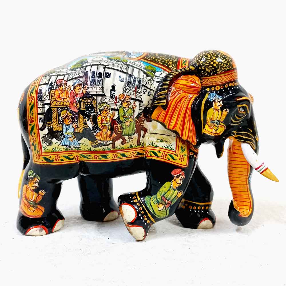 Elegant wooden elephant with Mughal miniature paintings on trunk, face, legs, and back, perfect for traditional decor and gifting.