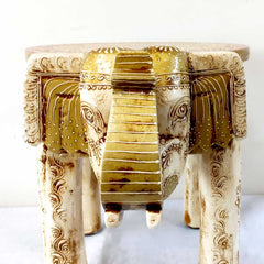 A beautiful wooden elephant that serves as both a functional stool and a decorative showpiece.