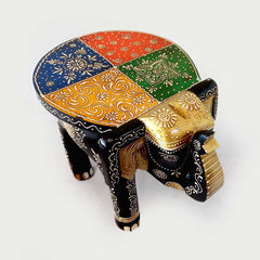 A beautiful elephant stool with a plain back and wonderful emboss painting, great for any room in your home.
