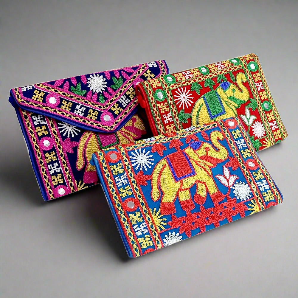 Beautiful embroidered clutch purse made of high-quality silk material with traditional and modern embroidery designs.