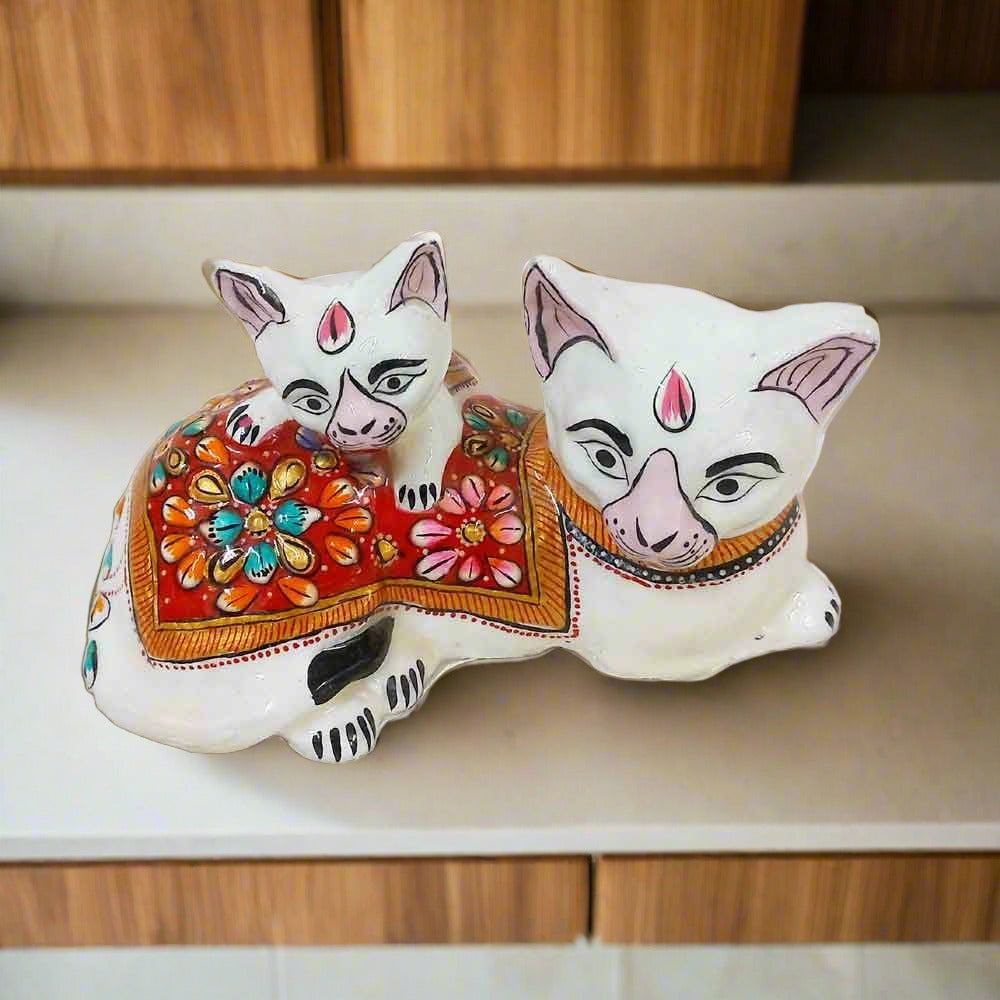 Metal baby cat figurine with colorful enamel decoration, sitting pose, and intricate craftsmanship.