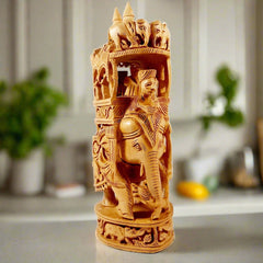 Beautifully carved kadamb wood Amabari elephant idol with intricate animal details, great for gifting and decoration.
