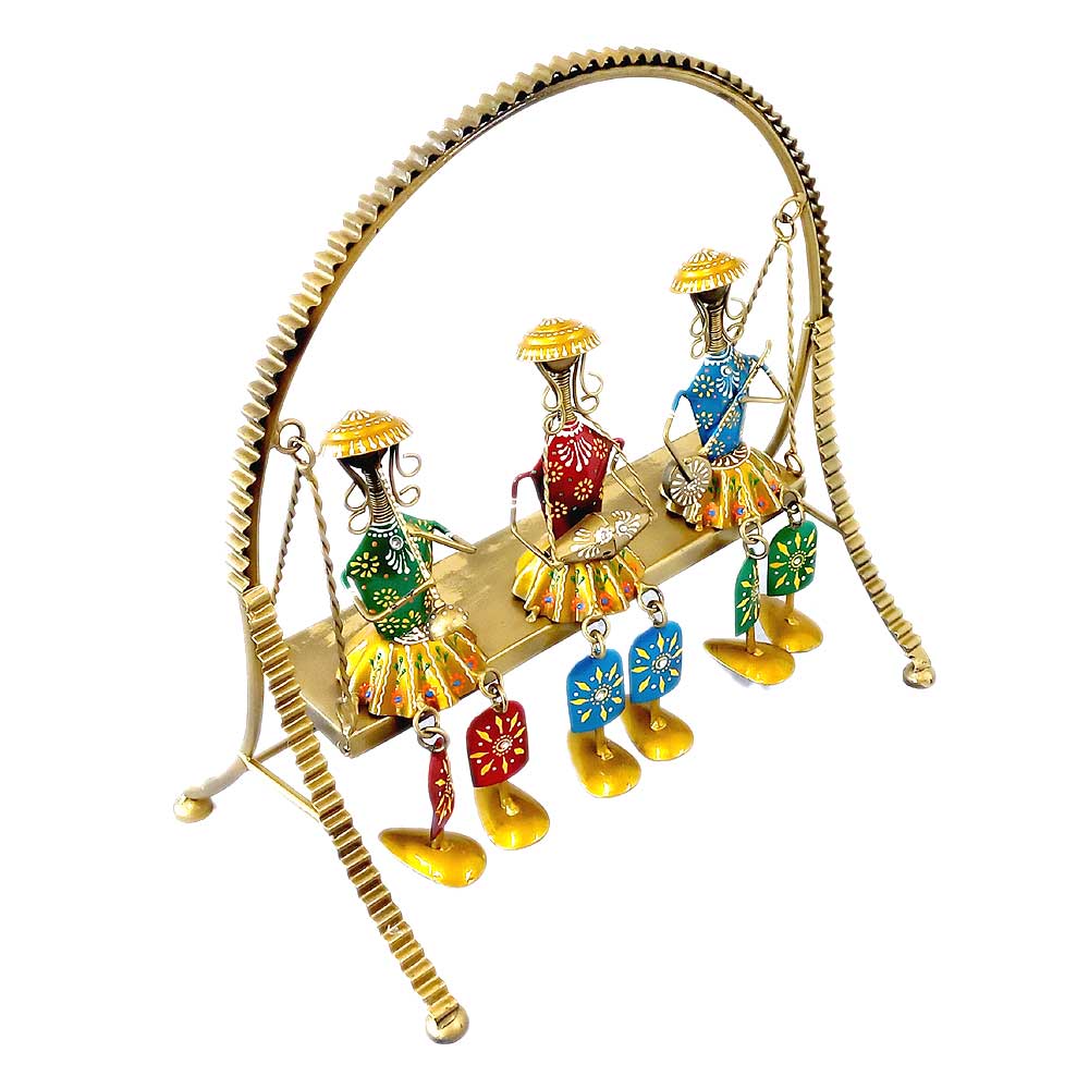 A fine quality metal jhula set with dolls decorated with colorful and hand-painted details.