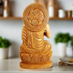 A wooden Buddha figurine with very fine workmanship.