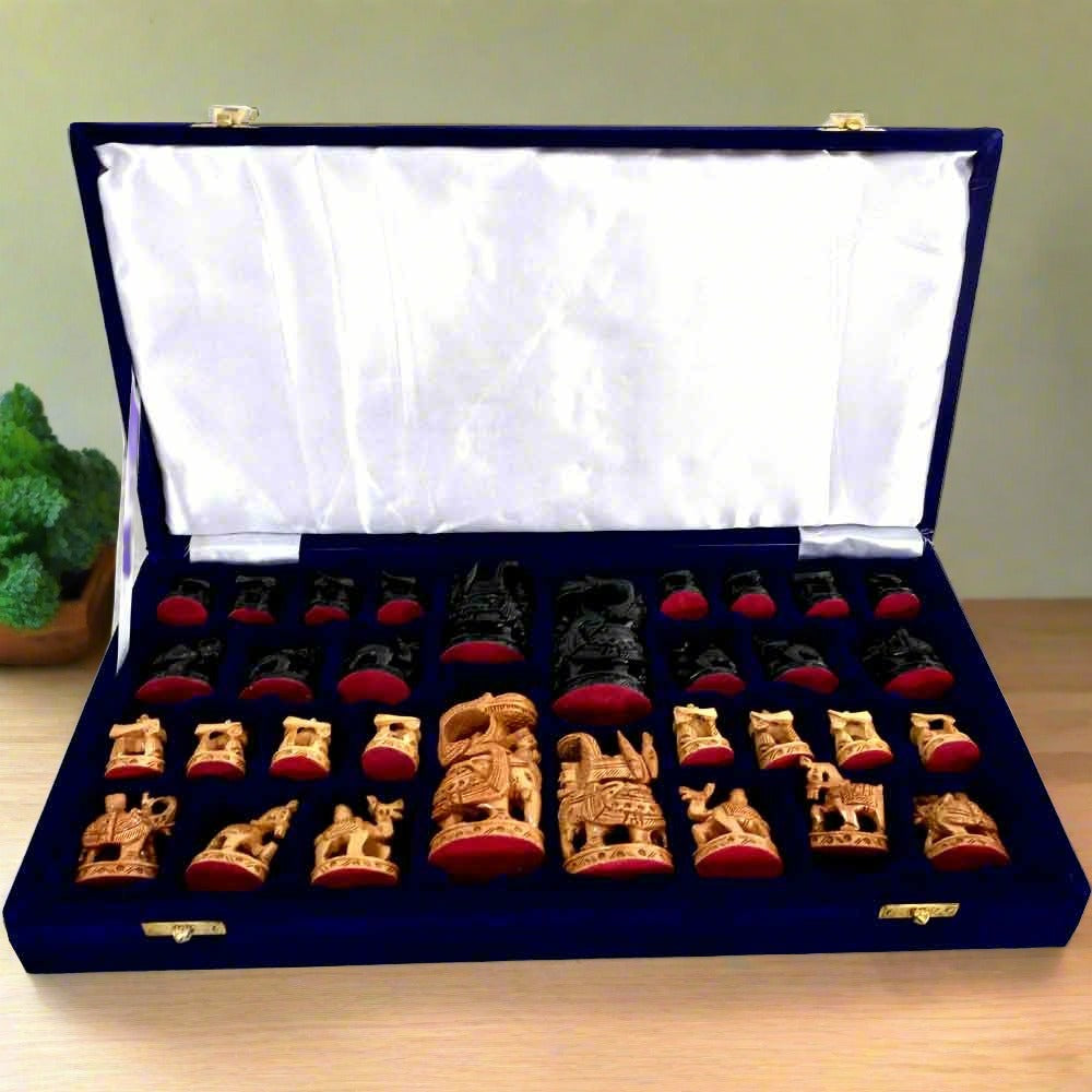 A wooden chess set with fine workmanship and an Ambadi figurine design, packed in a nice velvet box.